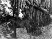 Woman on a horse.