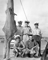 Men with sawfish.