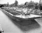 Oil barge and togboat on waterway in Bay County