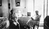 Women in the bedroom of the Breen home - Pensacola, Florida.