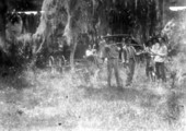 Unidentified group of men with rifles in Pinelevel