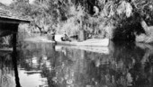 Mr. Elgin Wefing in his homemade steam boat