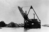 Miami dredge churning in Miami River.