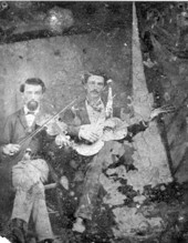 Thomas Blake Byrd and James A. "Dink" Herring playing violin and guitar.