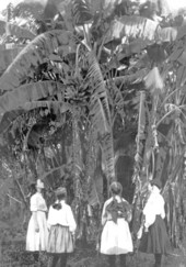 Girls looking at banana plants - Tallahassee, Florida.