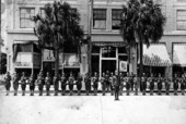 Eustis Home Guard lined up in the street