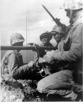 Members of 40 man patrol planting first American flag at Iwo Jima