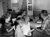 Children having vaccinations checked by the doctor - Green Cove Springs, Florida.