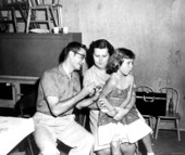 Young girl receiving vaccination shot - Green Cove Springs, Florida.