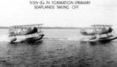 N3N-3's in formation (primary seaplanes) taking off by the Naval Air Station in Jacksonville