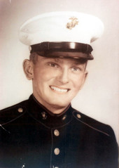 Portrait of Metro-Dade Police Department officer Earl Lee Johnson in his United States Marine uniform.