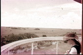 Tourist looks at Shark Valley from the overlook - Everglades National Park, Florida .
