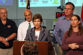 Secretary of State Sue Cobb addressing the media at the State Emergency Operations Center during a Tropical Storm Ernesto briefing.