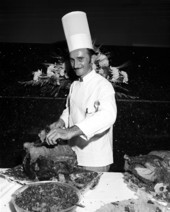 Portrait of an unidentified chef carving meat - Fort Lauderdale, Florida.