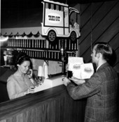 Customer at the register of the Purple Pickle - Boca Raton, Florida.