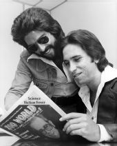 Kenny Loggins and Jim Messina of the Loggins and Messina rock-pop duo reading Zoo World music magazine - Fort Lauderdale, Florida.