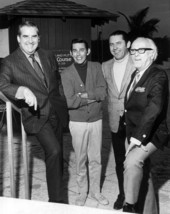 Tonight Show announcer Ed McMahon, left, standing with unidentified men for a group portrait - Fort Lauderdale, Florida.