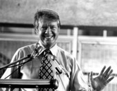 Presidential candidate Jimmy Carter smiling and waving to audience during his speech at Miami-Dade Community College North Campus