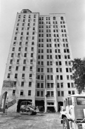 Pacific House hotel being demolished to make room for construction of the Miami-Dade Community College Mitchell Wolfson New World Center Campus.