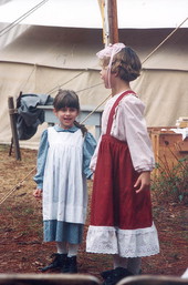 Unidentified girls in costume during festival for battle re-enactment at Olustee Battlefield Historic State Park - Baker County, Florida