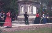 Reenactors gathered around monument during festival at the Olustee Battlefield Historic State Park - Baker County, Florida