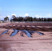 View showing the grounds at a sewage treatment plant.