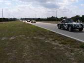Vintage MG race cars driving from Sebring Raceway to Sebring for "Taste of the Race" event..