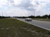 Vintage MG race cars driving from Sebring Raceway to Sebring for "Taste of the Race" event..