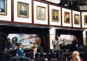 Interior view of the Florida House chamber showing Phillip J. Brutus speaking during a session in Tallahassee, Florida.