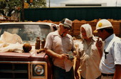 State Archaeologist Calvin Jones and men viewing artefacts recovered from an excavation site in Tallahassee, Florida.