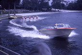 View showing water skiers performing on Lake Eloise at the Cypress Gardens theme park in Winter Haven, Florida.