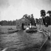 Women of the Holmes family from Pennsylvania near old boat house on Lake Conway.