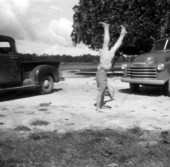 J.W. Jones doing a handstand near Bell, Florida.