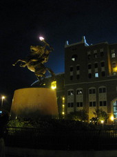 View showing the bronze sculpture "Unconquered" by Fritz White at the FSU Doak Campbell football stadium in Tallahassee, Florida.