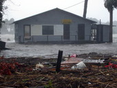 Flooding and debris at Davis Seafood during Hurricane Dennis in Apalachicola, Florida.