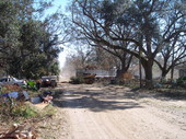 Debris cleanup in front of houses in Pensacola, Florida.