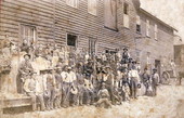 Group portrait at the Eagle Pencil Company cedar mill - Cedar Key, Florida.