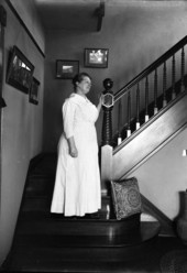 Unidentified woman standing on a stairway in Florida.