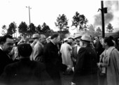Charley E. Johns shaking hands in a crowd at his campaign to be governor barbecue.