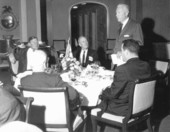 Florida Governor Farris Bryant and others listening to a speaker