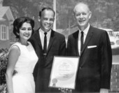 Florida Governor Farris Bryant holding an award.
