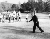 Florida Governor Farris Bryant pitching a baseball