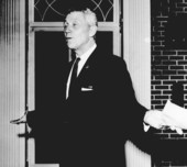 Florida Governor LeRoy Collins receiving a telegram from the KA fratenity