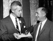 Florida Governor LeRoy Collins presenting a man with a pen
