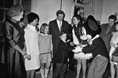 Florida Governor Askew and family with Mickey Mouse and a Disney representative.