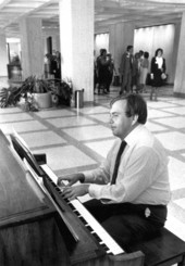 Representative Byron Combee playing the piano at the Capitol.