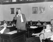 Senator having his say as others listen