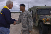 Governor Charlie Crist shaking hands with an unidentified Florida National guardsman during Tropical Storm Fay.