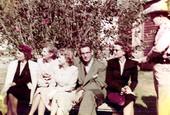 Governor Dan McCarty and his wife sitting with women