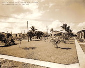 View looking west showing courtyard between cottages at Layton's Cottage, Trailer, and Fishing Park - Riviera Beach, Florida.
